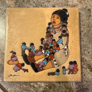 Vintage ceramic tile by Leone Kuhne featuring Native American woman storyteller